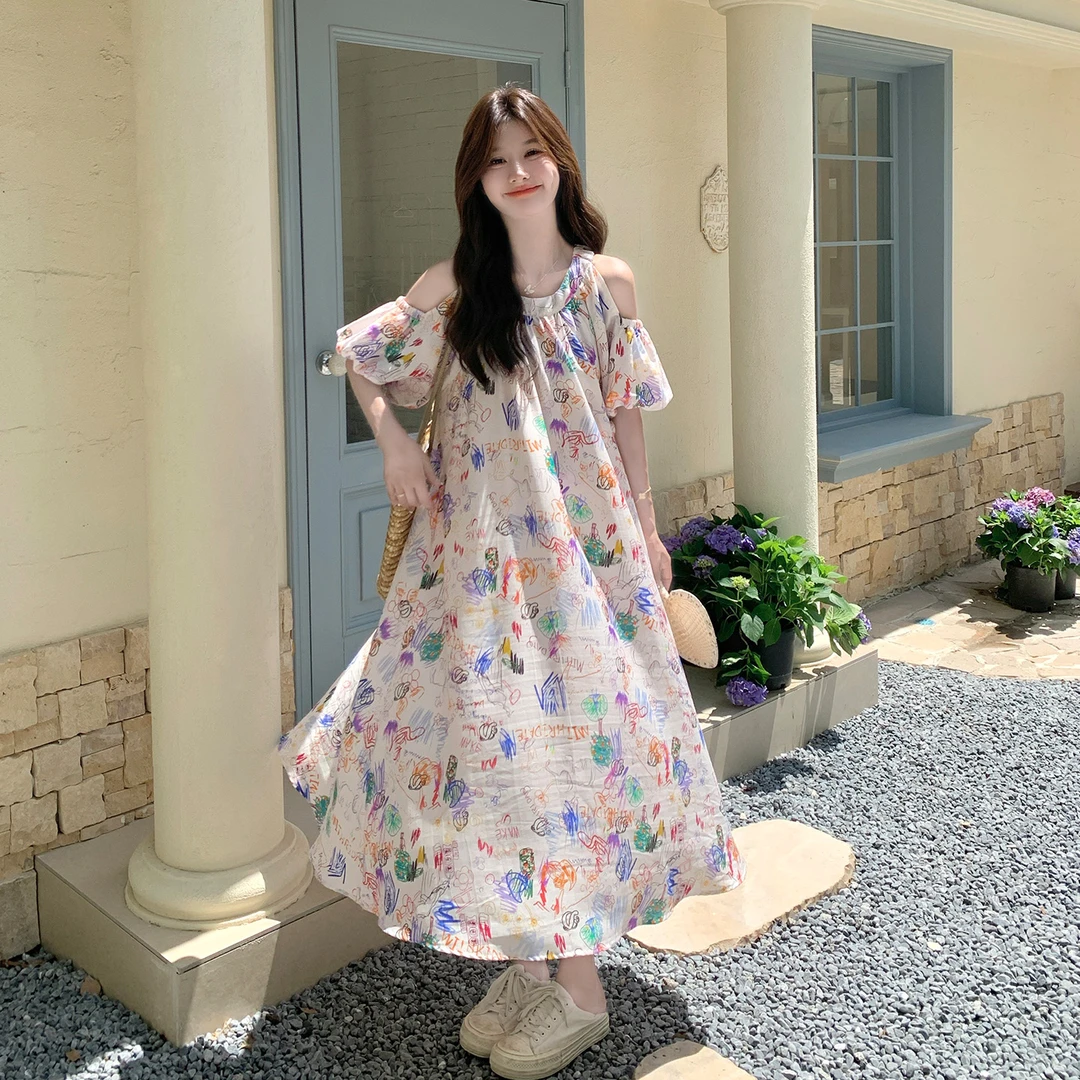 涂鸦碎花泡泡袖露肩短袖连衣裙女夏季今年流行爆款设计感小众长裙