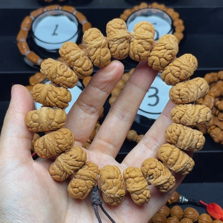 仁***韵桃核吊坠霸王龙^_^