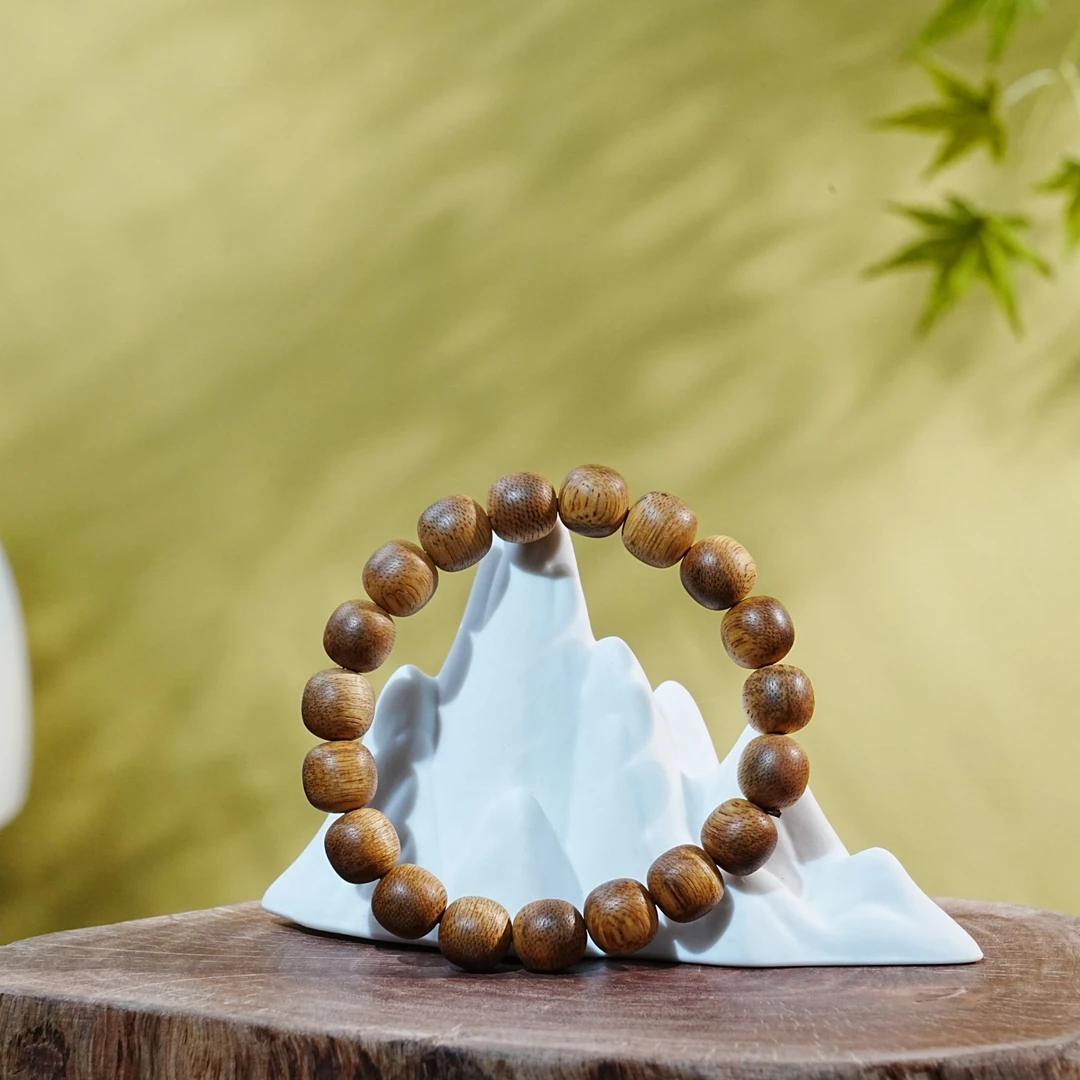 "印尼坤甸黄油老料沉香鼓珠手串1.0x1.0cm  8.9g 251005081 A