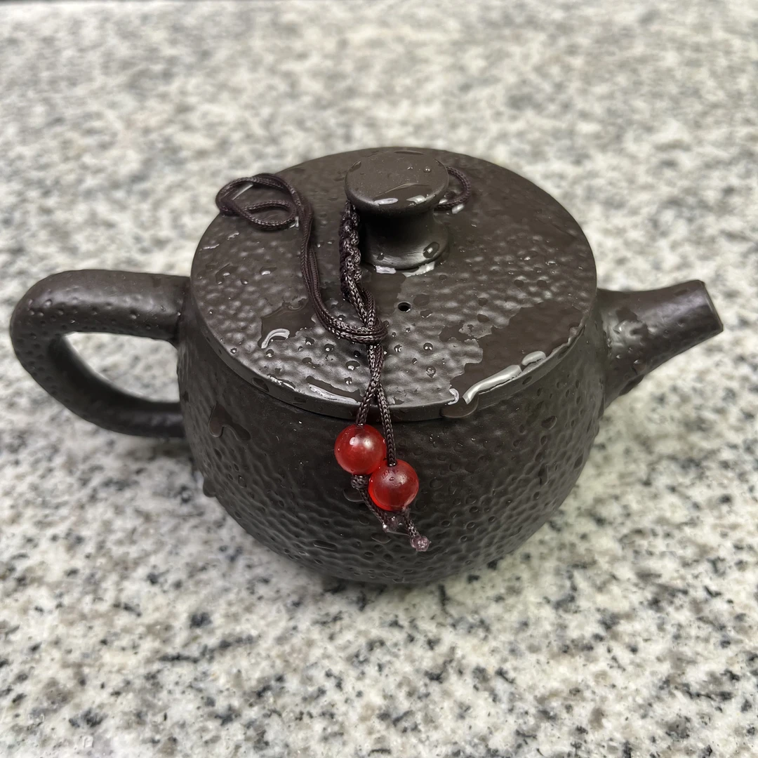 手锤纹汉瓦壶凤鸣壶
