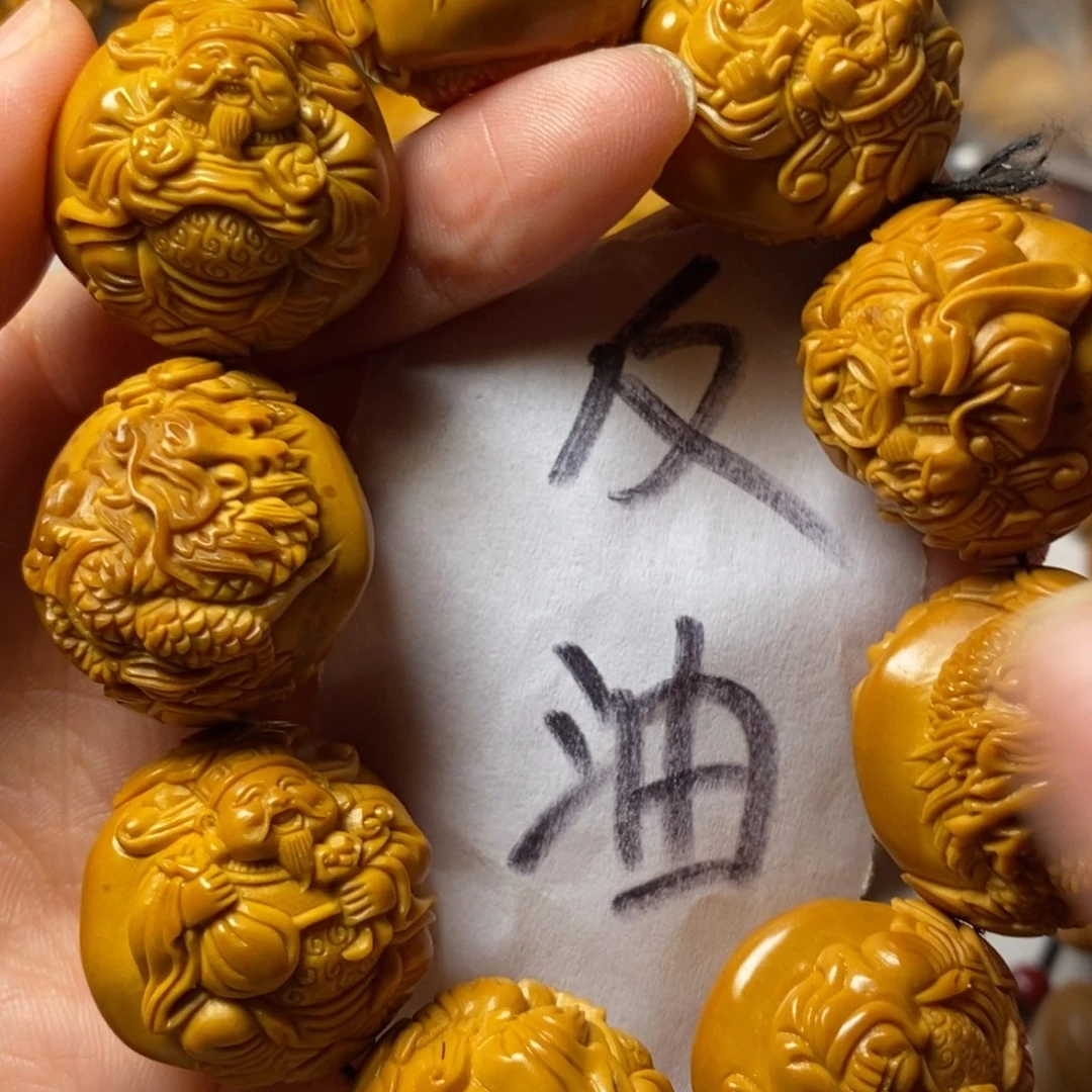毛***酪手串/手链橄榄核上色九龙财神精品