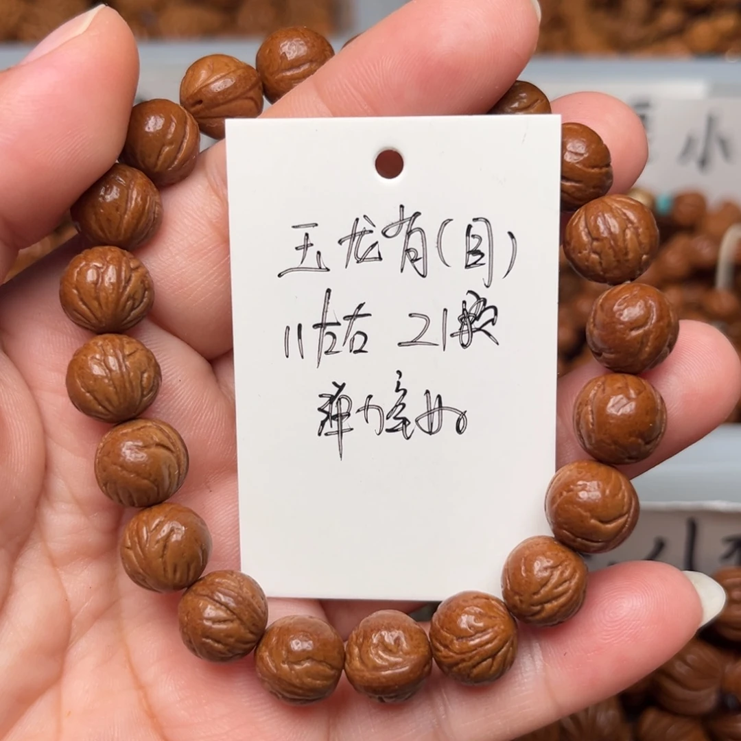 用***3桃核把件11左右玉龙脊手串