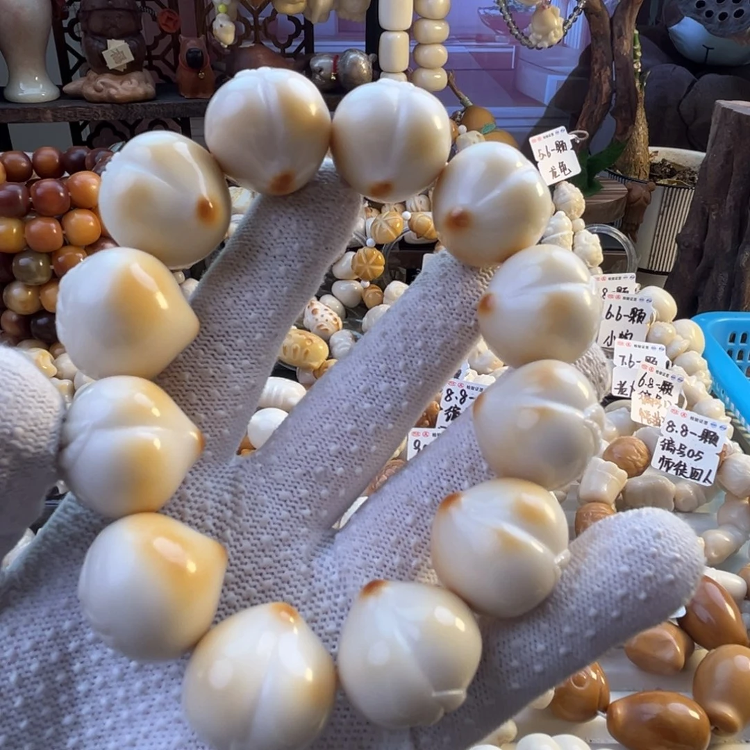 手串菩提根/象牙果-烤色寿桃