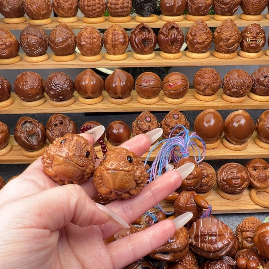 呵***。手串/手链橄榄核金蝉