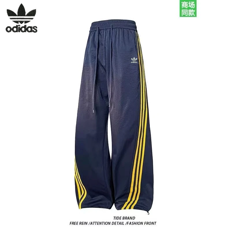 奥莱撤柜春夏秋日梭织扭扭男女同款长裤显瘦休闲裤运动时尚