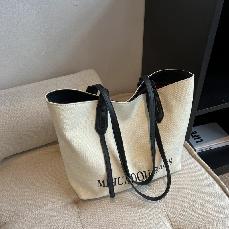 帆布包包女大容量2025新款日系布包单肩包大学生上课通勤包托特包