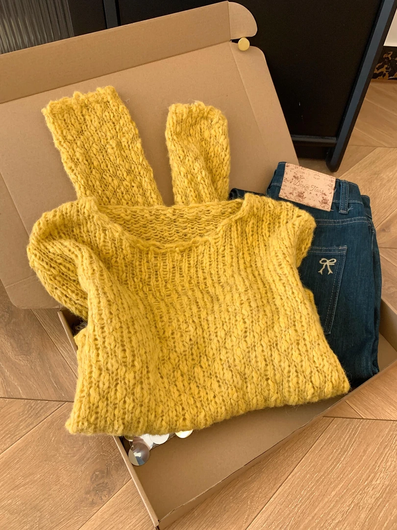 高级感超好看黄色针织衫毛衣女2025秋季新款气质绑带镂空撞色上衣