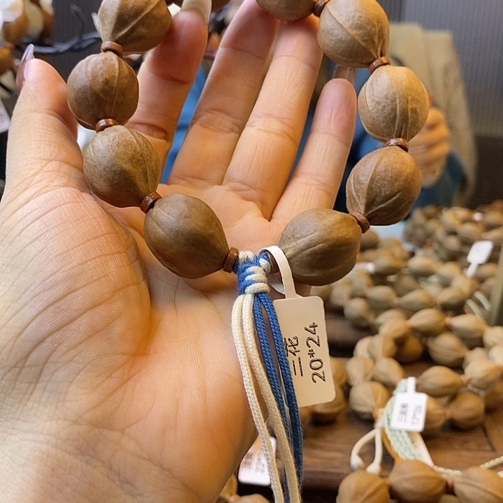 宇***泽橄榄核吊坠梅林铁核