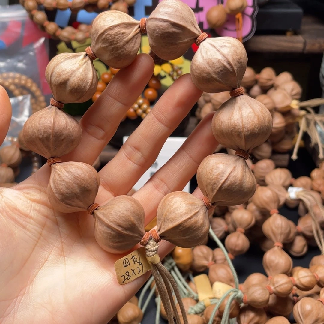 青***悔吊坠橄榄核2829四花铁核