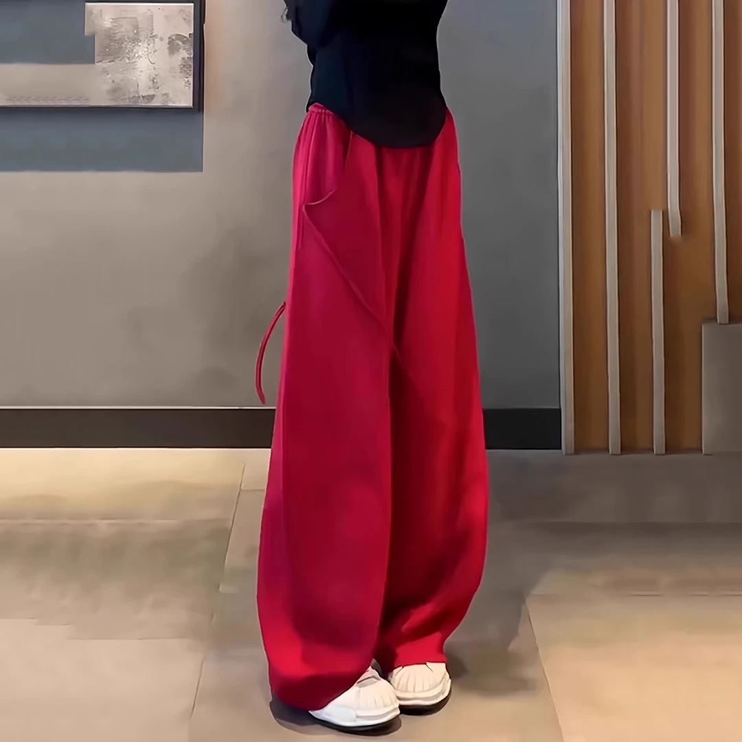 红色加绒阔腿裤子女款爆款2025新款休闲香蕉裤今年流行弯刀裤卫裤