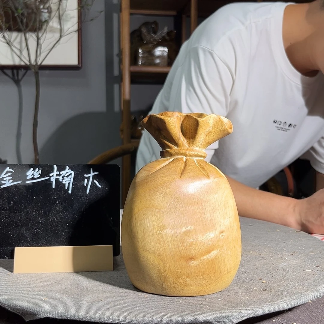 金丝楠咖***伴一图一物577656990005