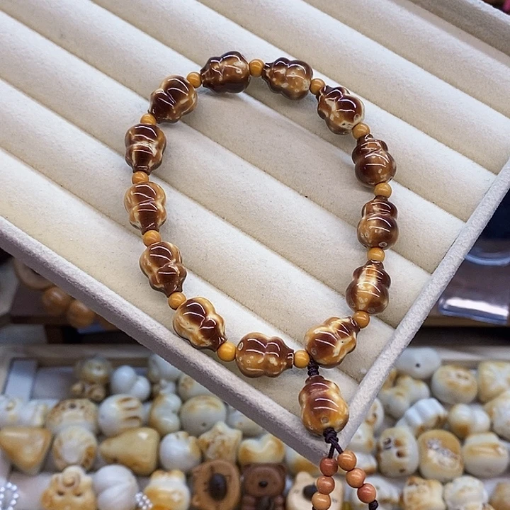 文***雯把件猴头核桃紫金鼠葫芦