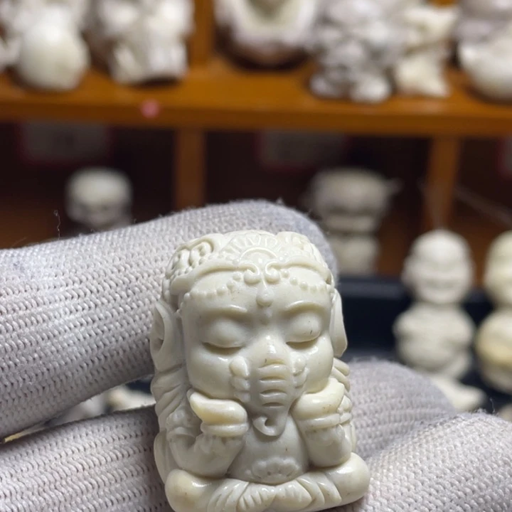 冰***茶非金属皮质配饰鹿角雕刻象神