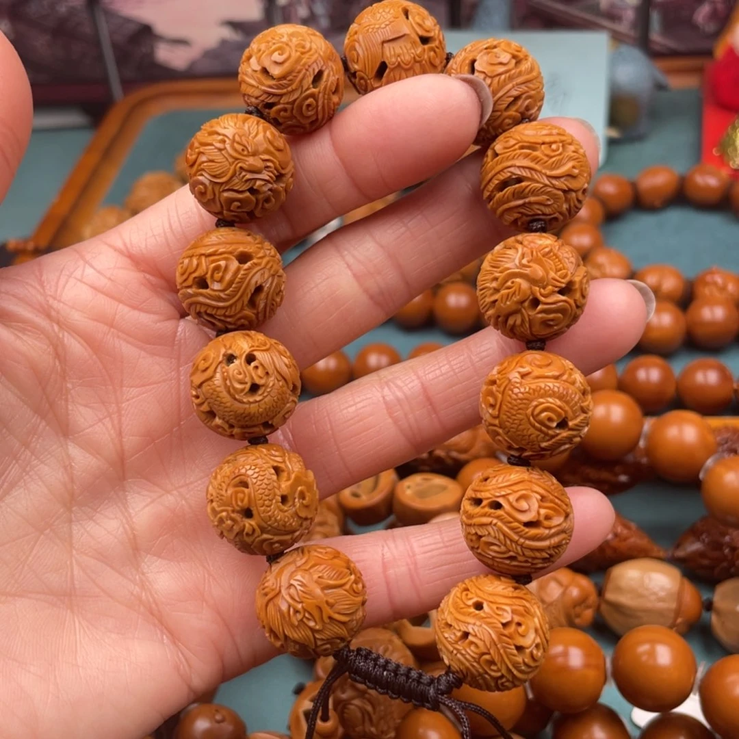 橄榄核手串M****n水晶核龙凤