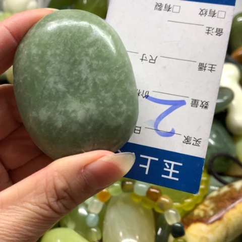 晴***里蛇纹石玉未镶嵌手把件