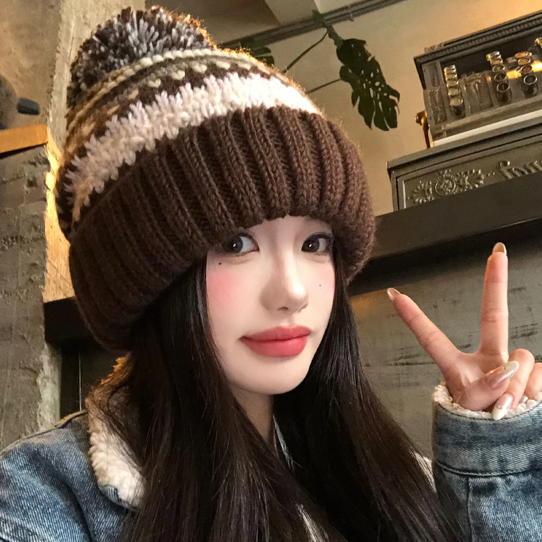 费尔岛咖色毛球针织毛线帽女秋冬保暖加厚防寒显脸小护耳包头帽子