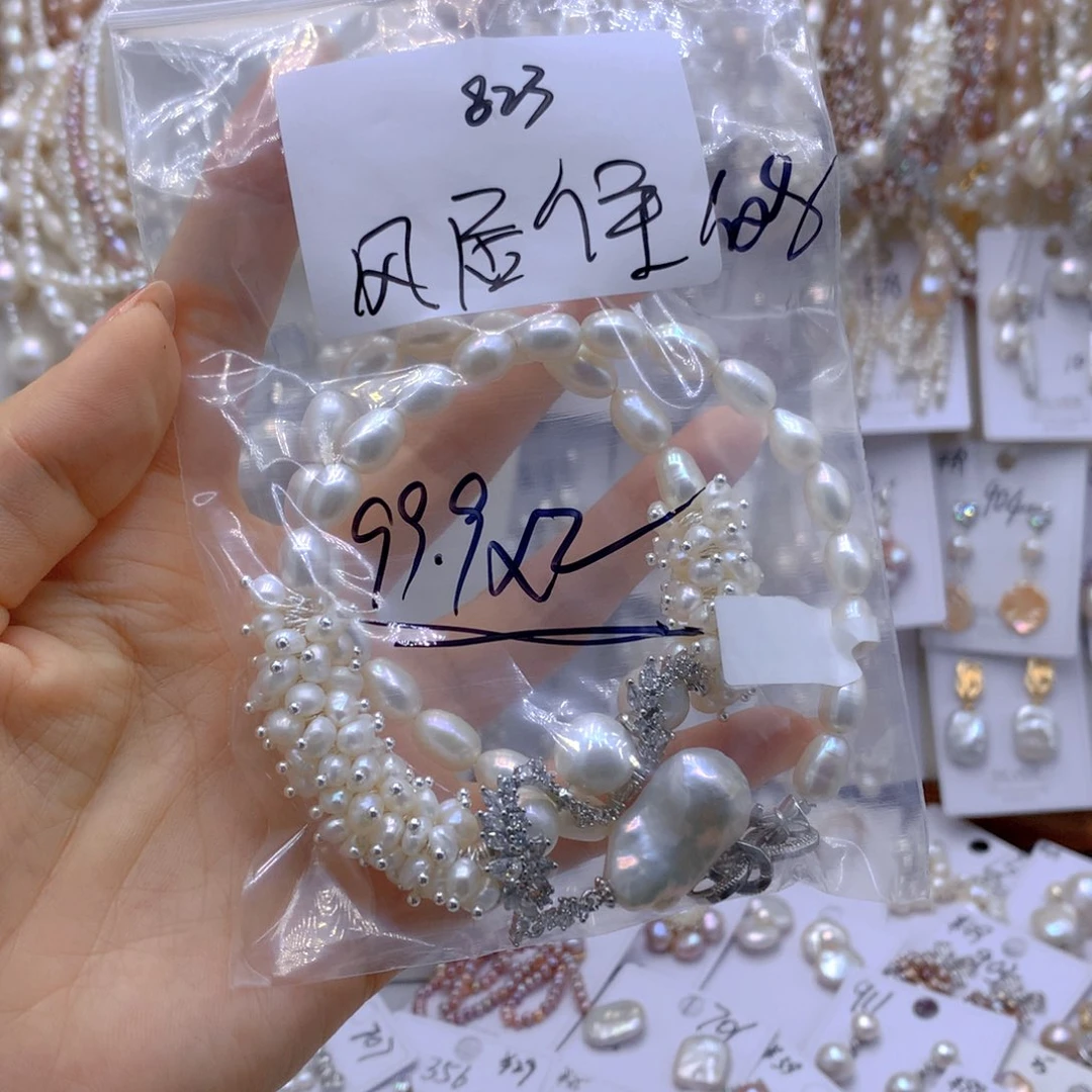 银S925镶嵌淡水珍珠耳饰风****@