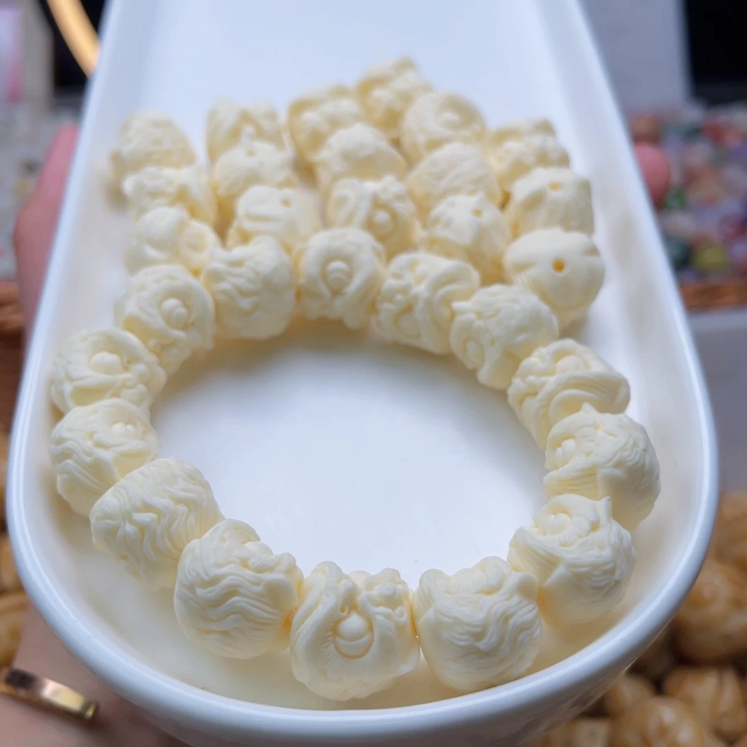 吊坠白玉菩提q16mm/5颗象牙果醒狮