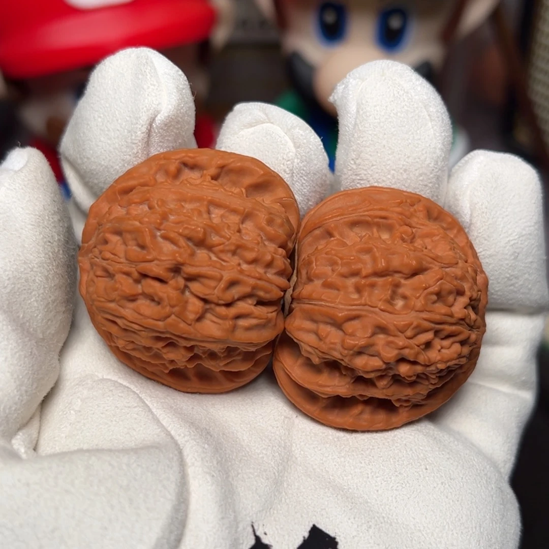 橄榄核把件全品红皮白狮子40.5