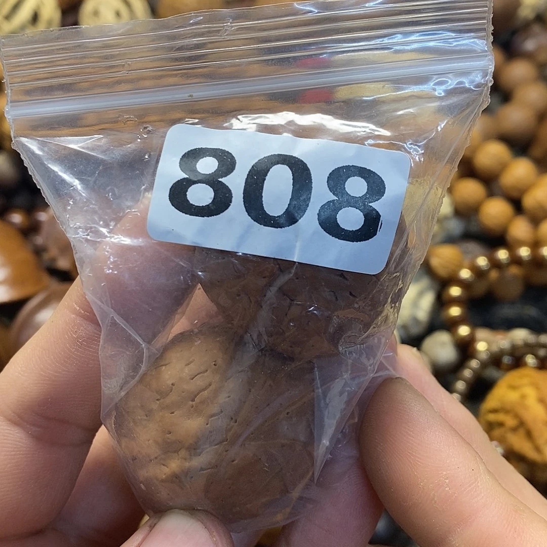 橄榄核吊坠哥****人