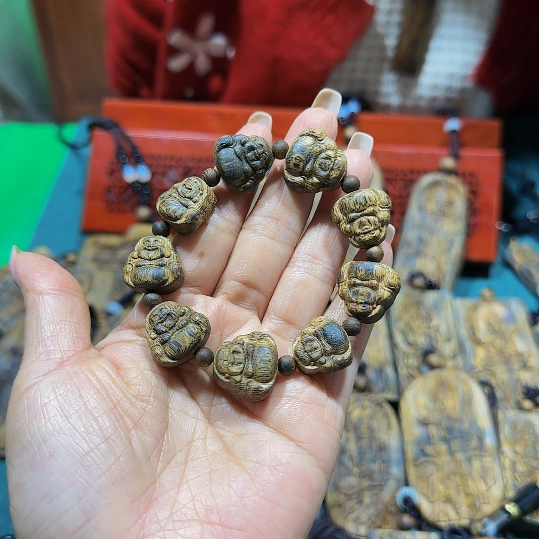 沉香手串小*海南白奇乌身老料雕刻佛公手串11.3克多样性发