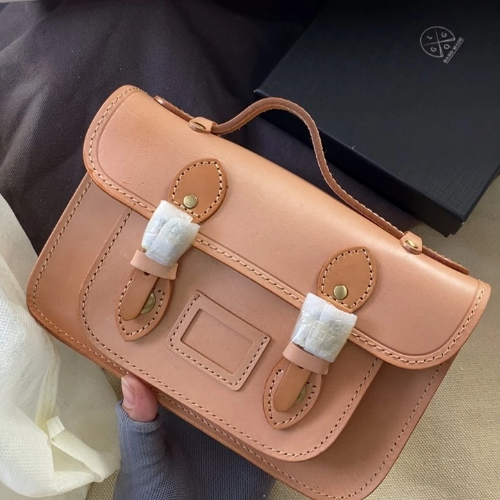 头层牛皮瑕疵单肩包