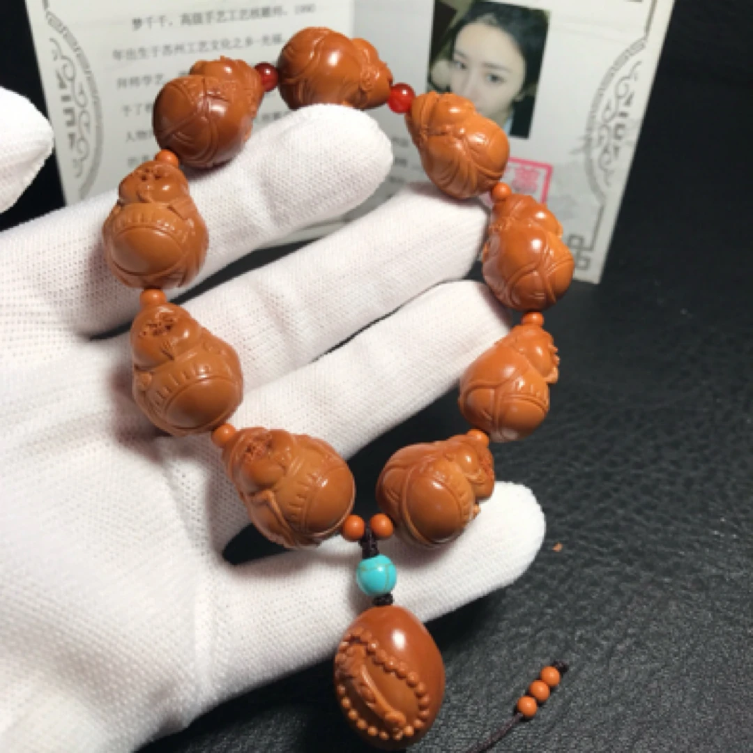 苏工橄榄核雕如意小财神手串尺寸1.6*2.1cm小籽文玩老油核带证书
