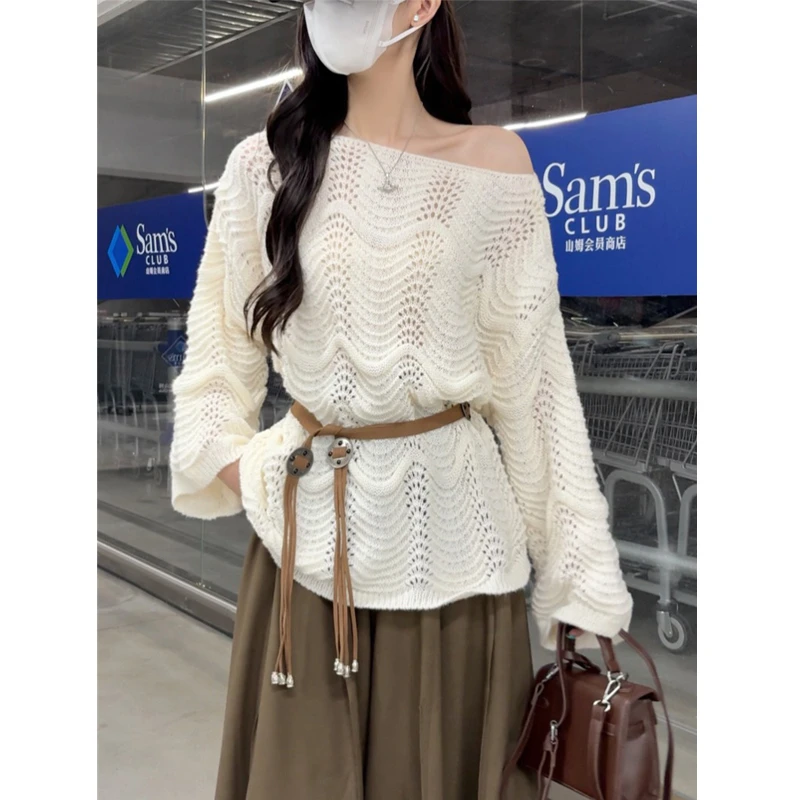 法式温柔风镂空针织衫女2025秋季新款慵懒设计感外搭罩衫长袖毛衣