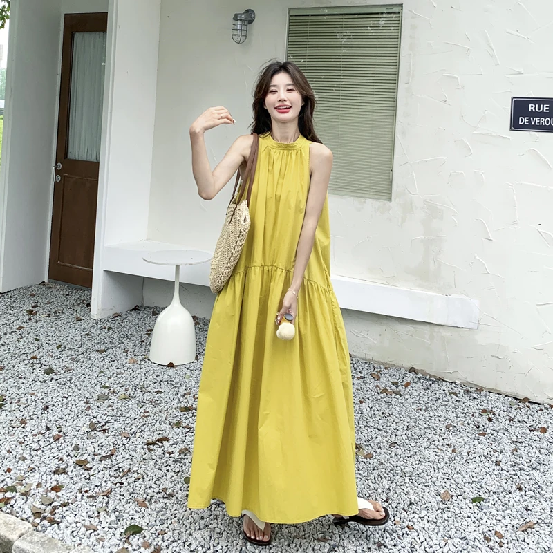 多巴胺黄色无袖挂脖连衣裙女2025夏季新款初恋清纯甜美长款a字裙