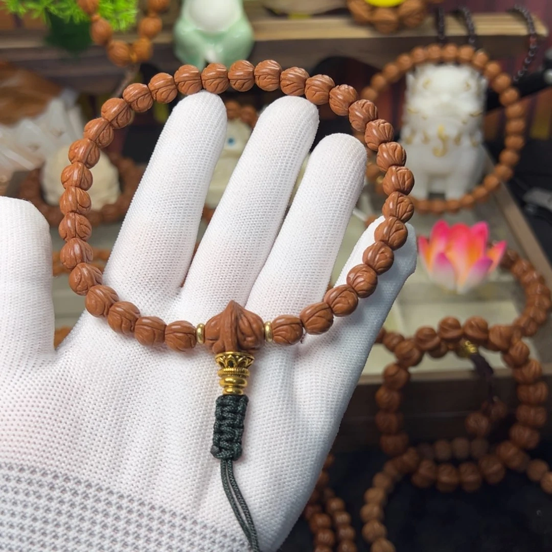 徐***欢吊坠桃核玉龙脊手持09