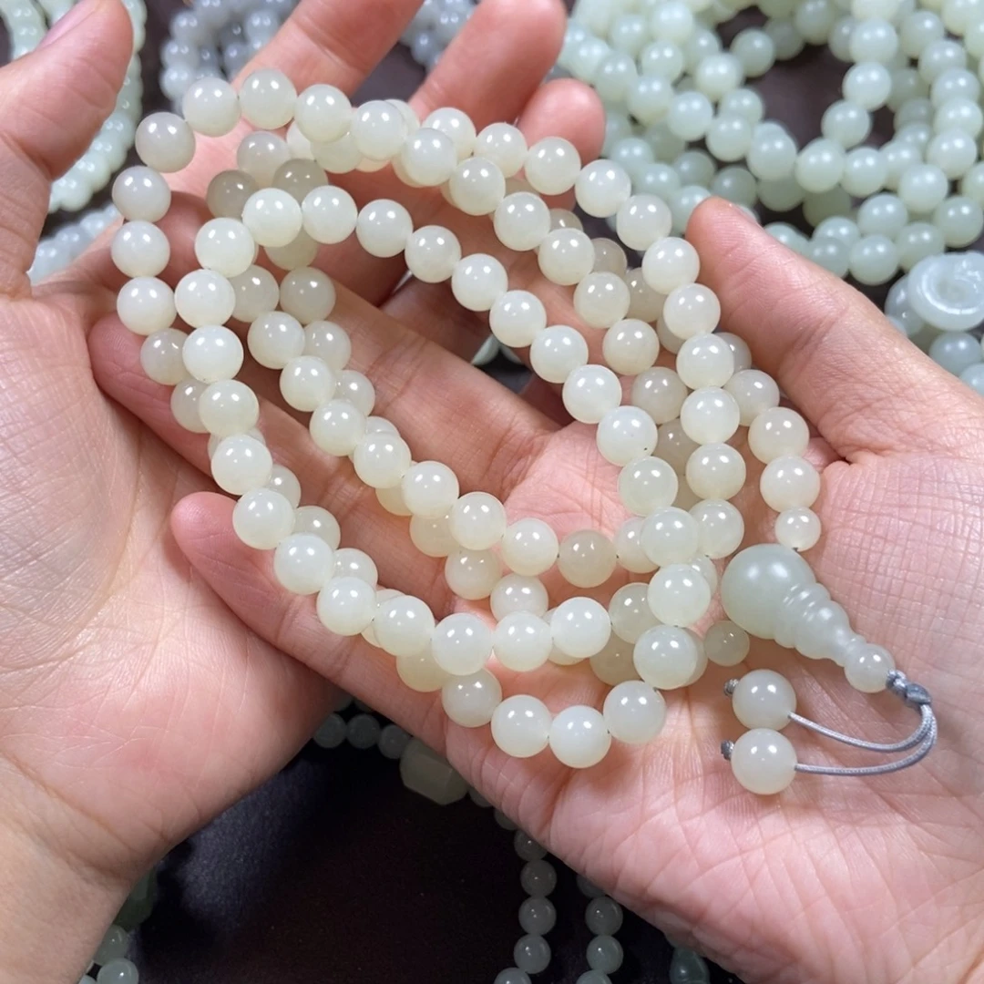 刘***强和田玉未镶嵌把件