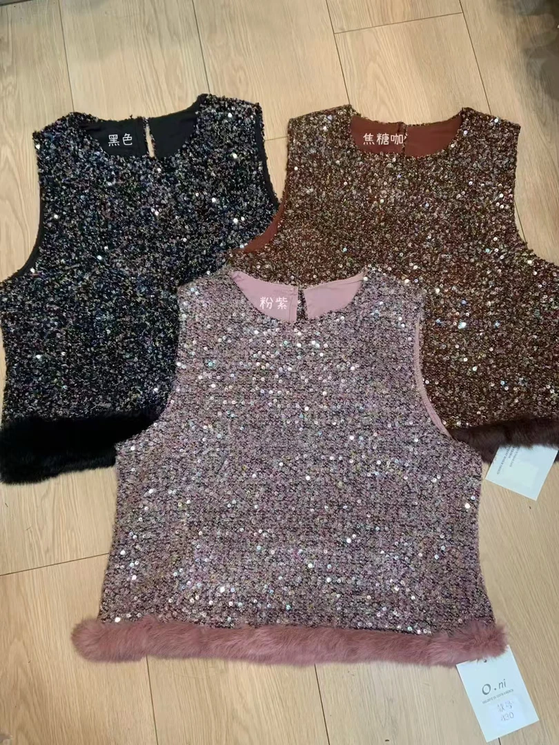 830新款时尚重工亮片无袖毛边背心