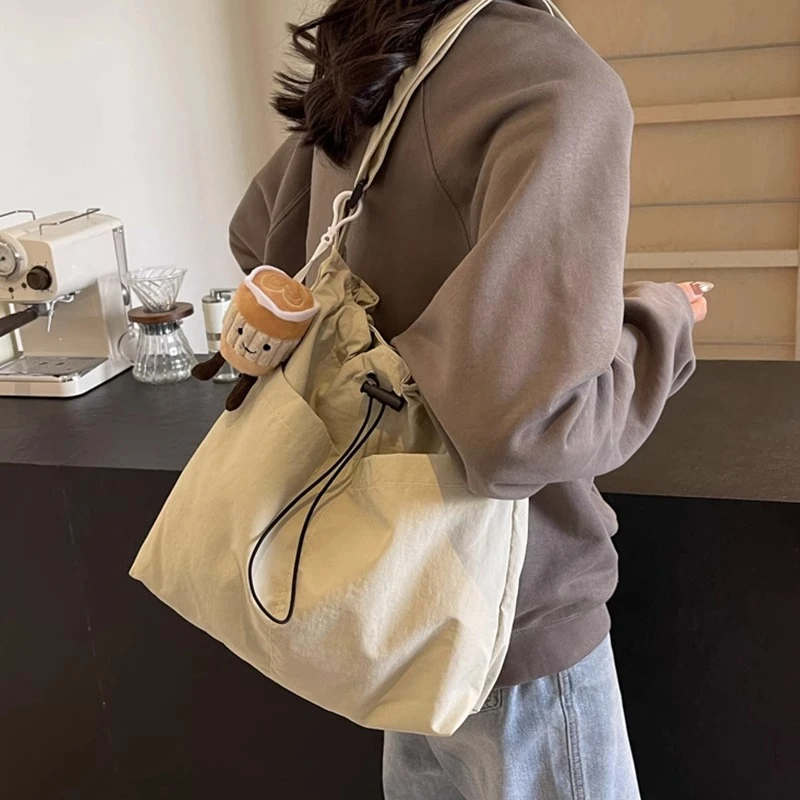 尼龙斜挎大包包女2025新款时尚帆布包单肩大容量托特包上课通勤包