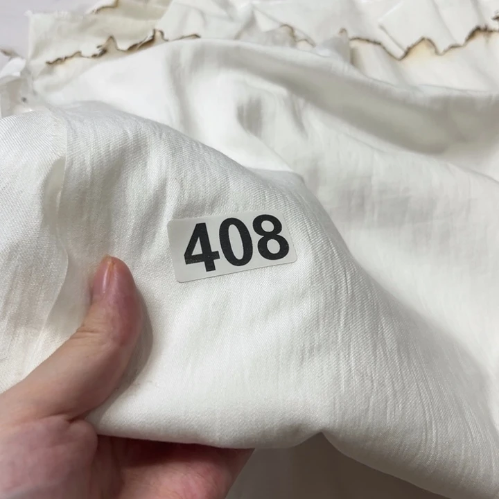 棉混纺408。 1米瑕疵白