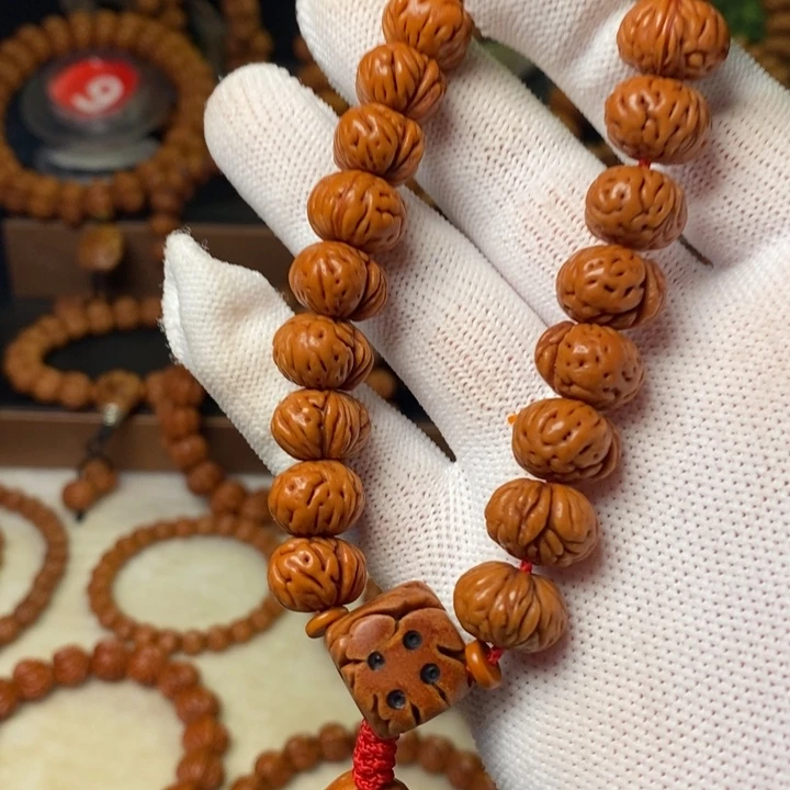 我***静手串桃核秦岭龙纹桃核