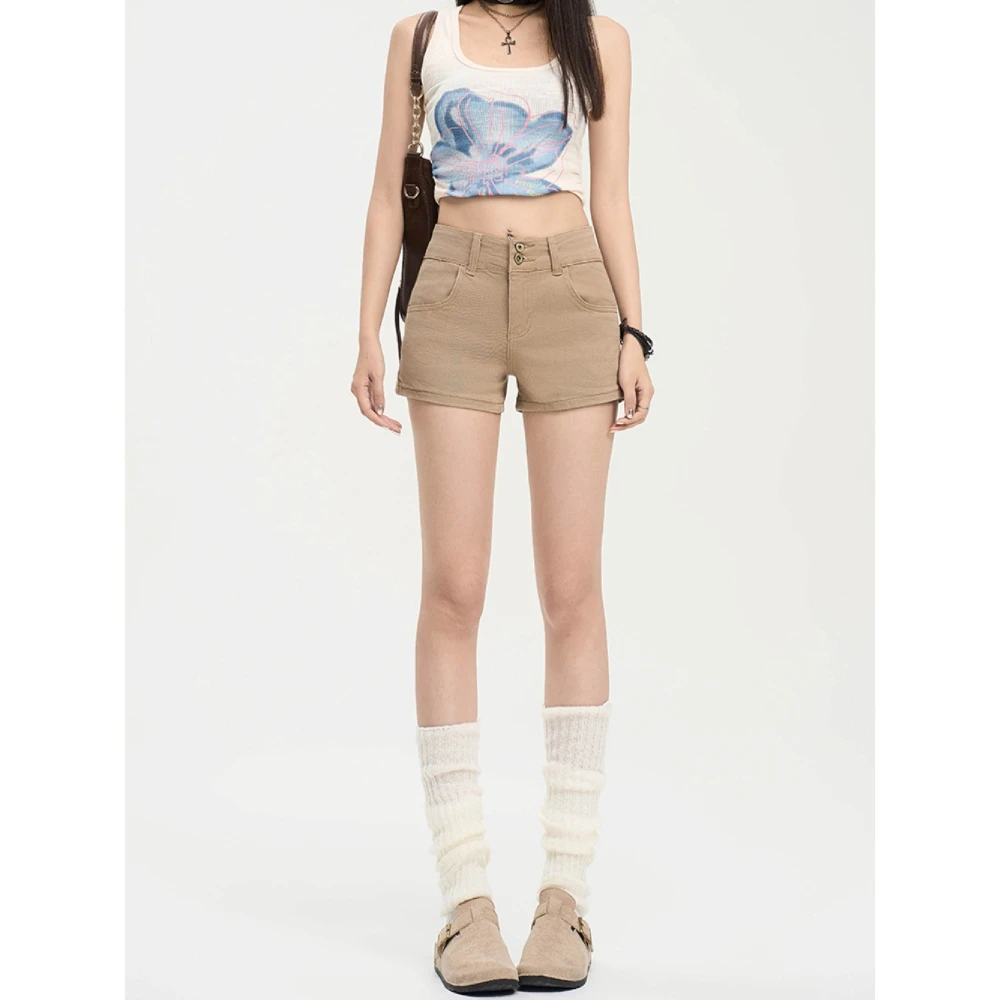 美式复古卡其辣妹包臀牛仔短裤女夏新款高腰双纽扣a字休闲热裤子