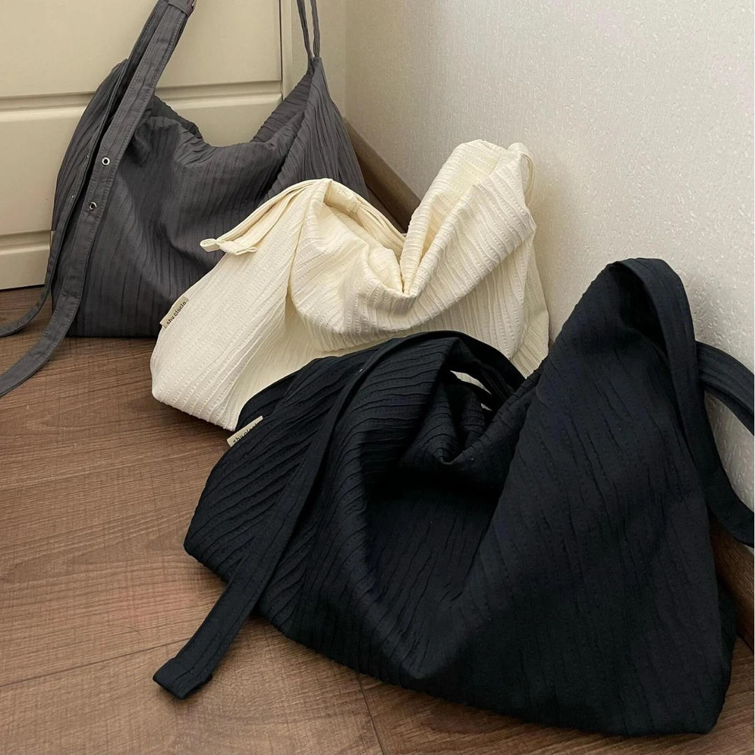 韩系小众肌理感条纹双肩包女大容量通勤松弛流浪包学生单肩斜挎包