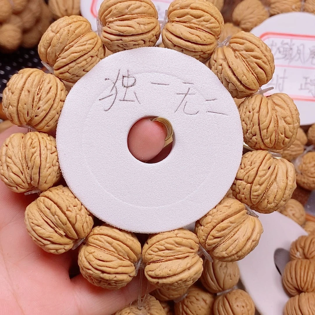 桃核手串?**棒龙鳞野生大开口23