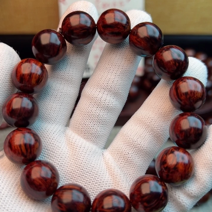 木何**从海南红降1.5黑金满油满香精品圆珠