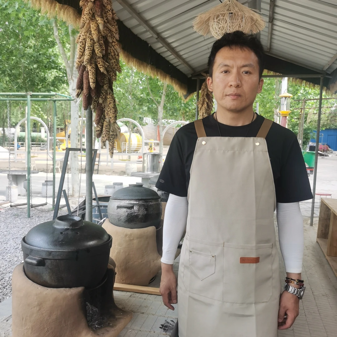 北欧帆布围裙时尚简约厨房餐厅工作室厨师男女防水围裙家用做饭
