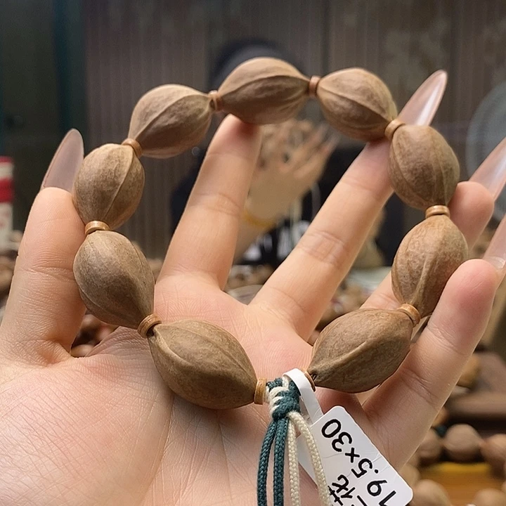 林***哥橄榄核手串梅林铁核