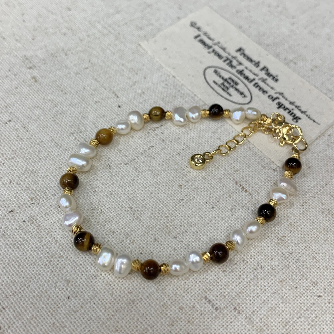 S177 淡水珍珠虎眼石简约搭配延长手链时尚轻奢。