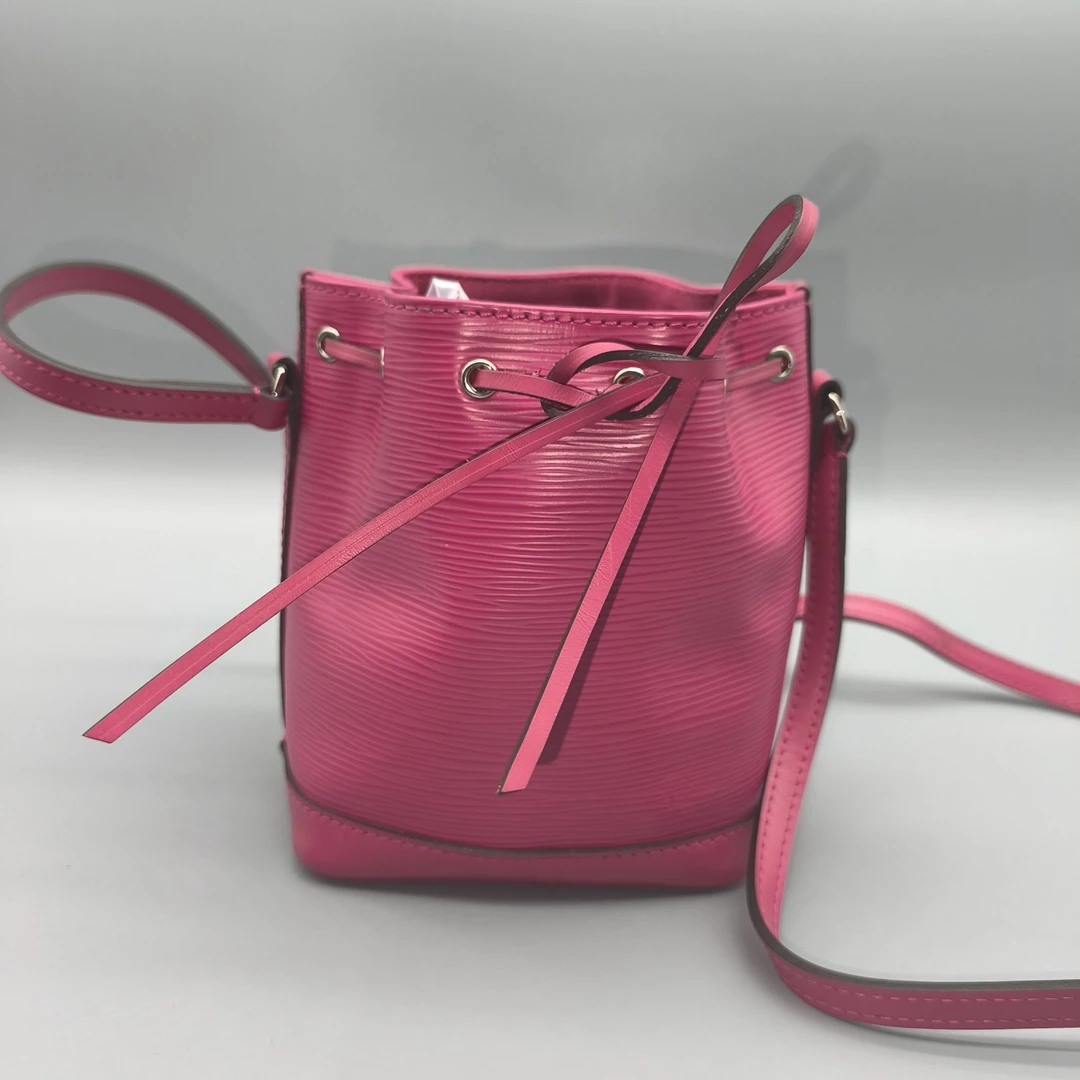 95新 LouisVuitton/路易威登  玫红色水波纹水桶包 1663 7771