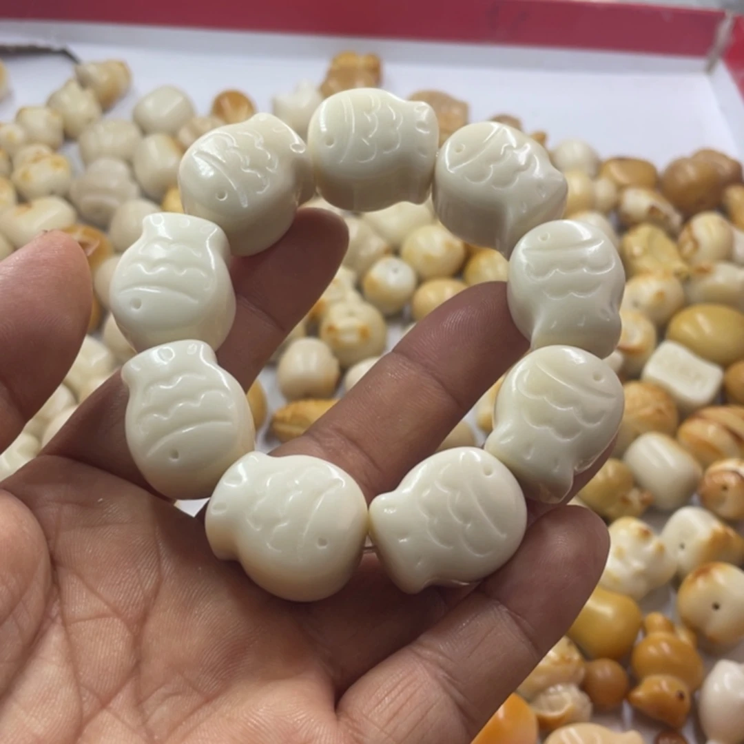 林***京吊坠菩提根/象牙果微瑕象牙果鱼饼烤色十颗