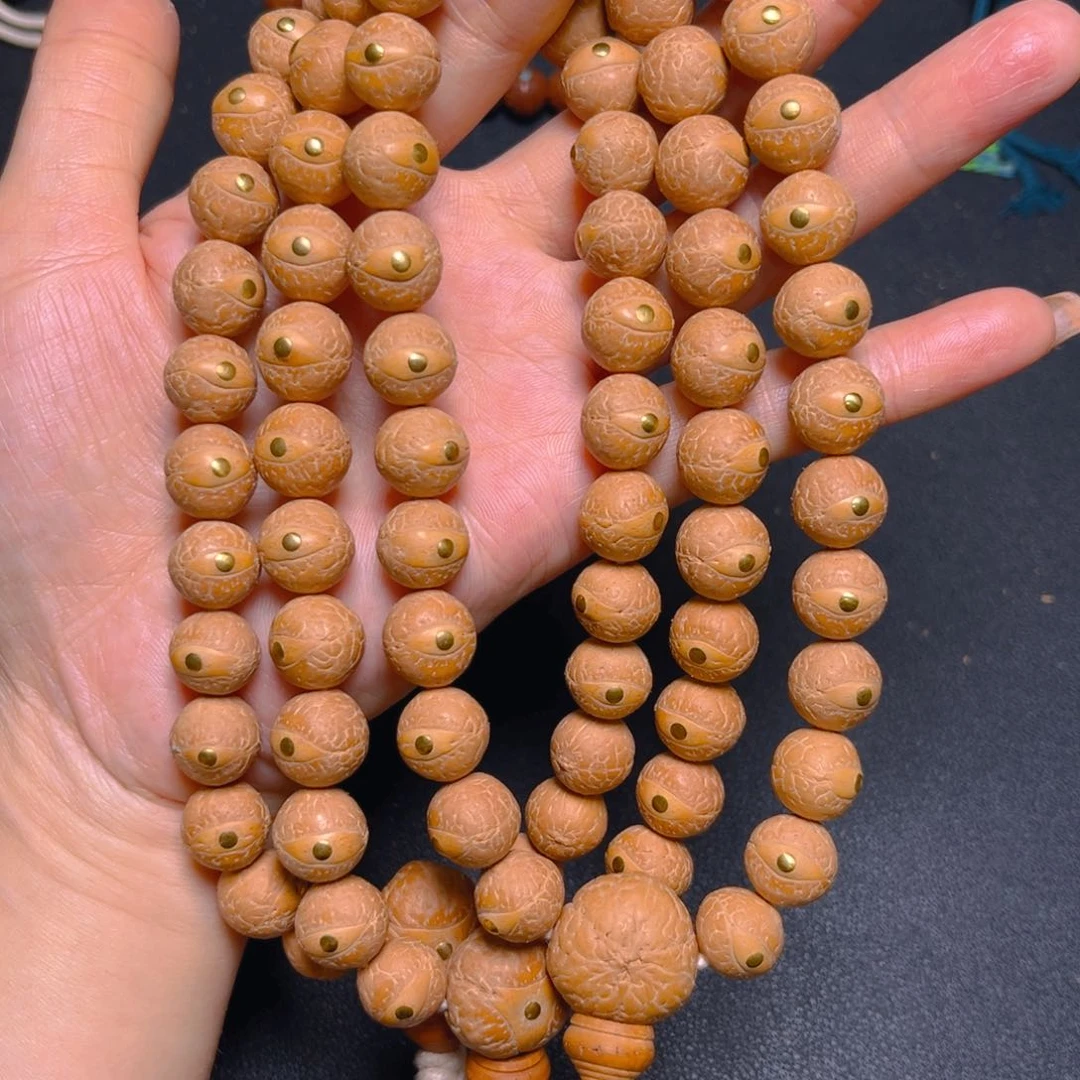 凤眼菩提吊坠12mm精品铜钉27颗手持