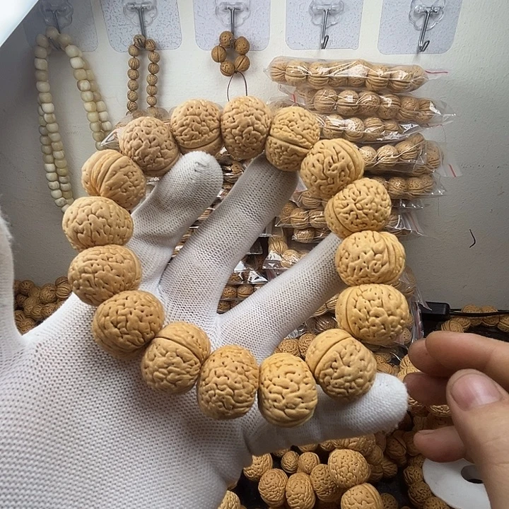 加***辣桃核吊坠桃核的大小可以调节其正常分泌