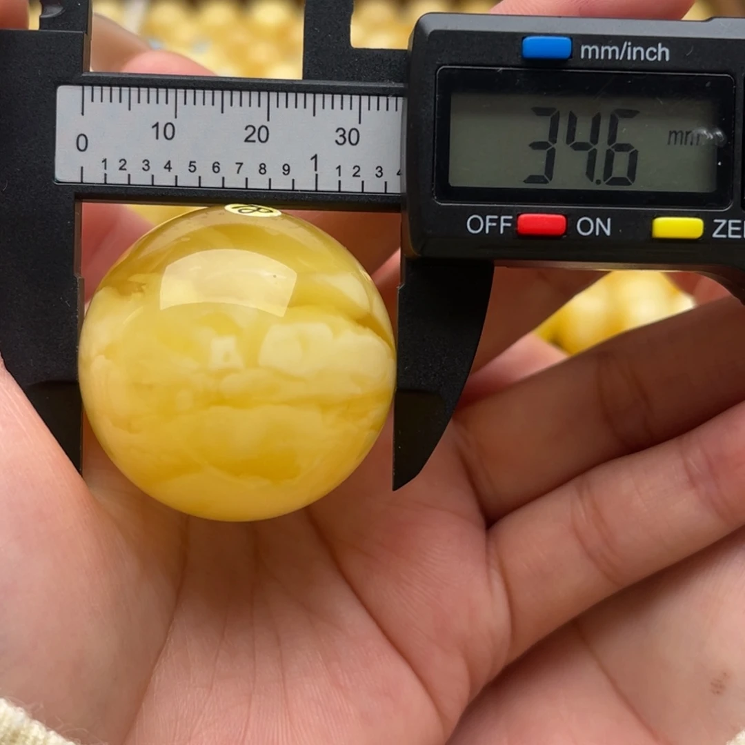琥珀未镶嵌裸石蜜蜡圆珠微瑕笑