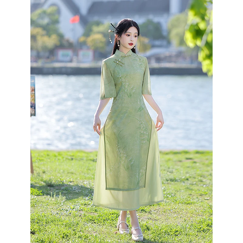 绿色奥黛旗袍2025新款高端高贵改良年轻款少女新中式日常可穿夏季