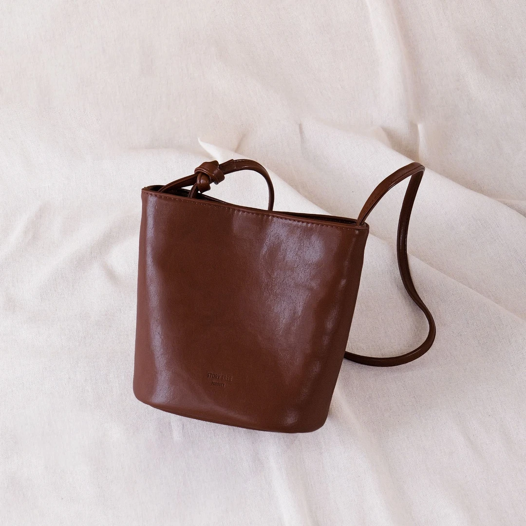 水桶包牛皮单根车缝线耐磨复古单肩包女士百搭韩版通勤