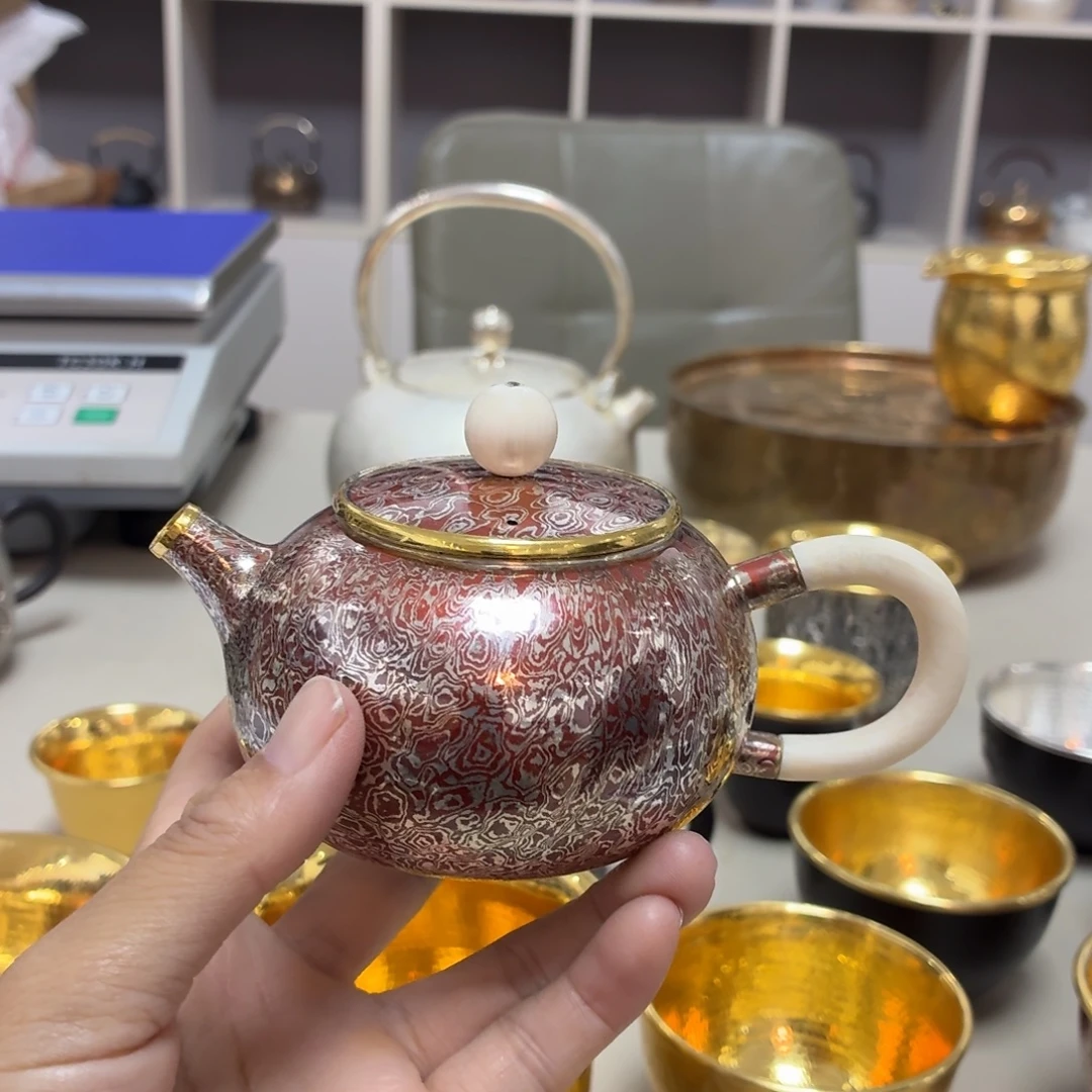 ****嘉李小鹤木纹金西施壶